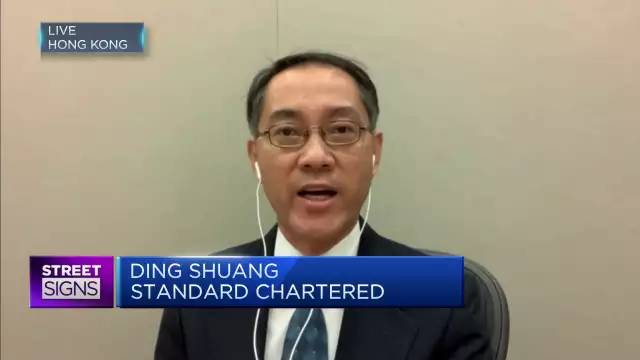 China's property sector remains a drag on its economy, says Standard Chartered