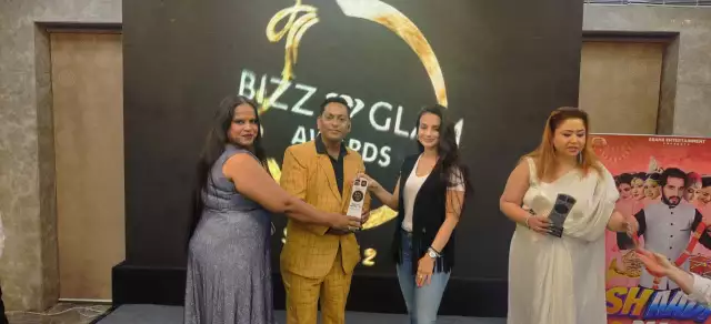 Pawan Chauhan and Shaista Ansari of Realty Quarter honored with Best Real Estate Onfield Aggregator and Media Company of the Year 2023 Awards by Ameesha Patel at BIZZ GLAM AWARDS 2023 Season 2 -