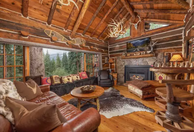 A Natural Water Element Sets Colorado Log Cabin Apart